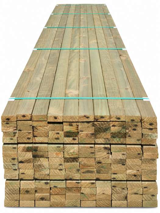 Stacked treated radiata pine timber bundle.
